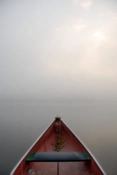 misty morning with canoe