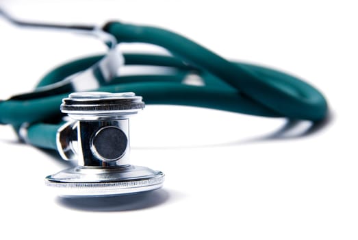 Stethoscope in green on an isolated white background