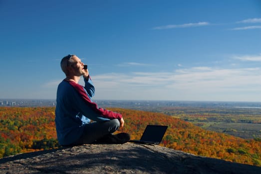 getting away from it all on the laptop in nature