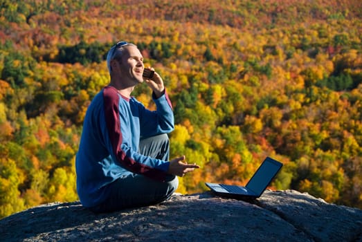 getting away from it all on the laptop in nature