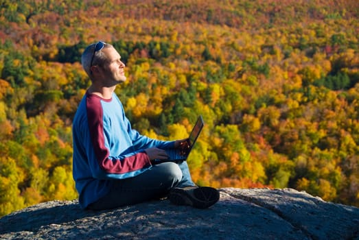 getting away from it all on the laptop in nature