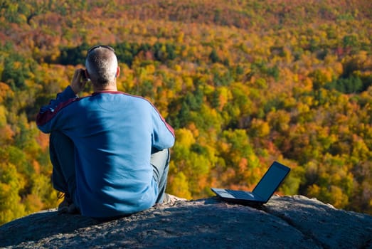 getting away from it all on the laptop in nature