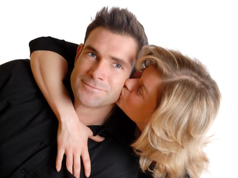 woman kissing her cute man on the cheek