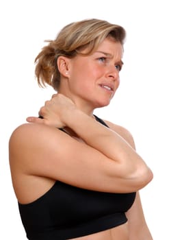 woman in training gear in pain holding her neck