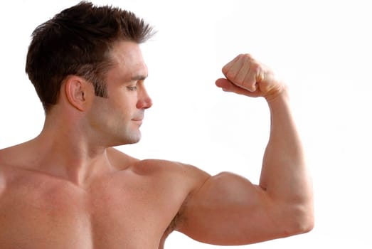 man flexing his biceps to show off his strength