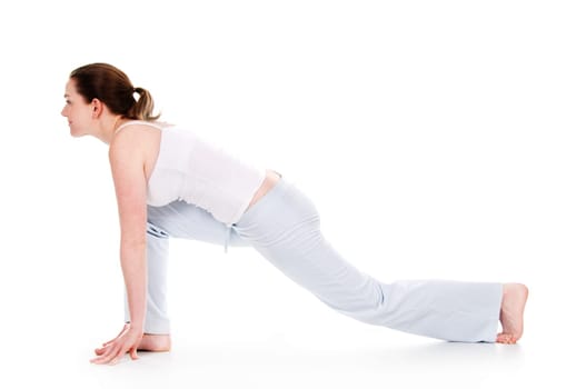 Beautiful woman doing yoga on isolated white background