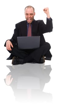 happy business man on a laptop on white