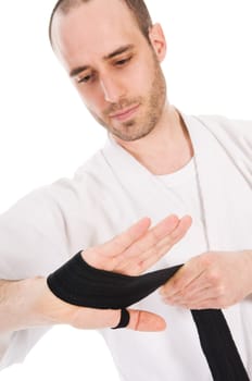 White man doing martial arts on isolated background
