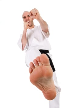 White man doing martial arts on isolated background