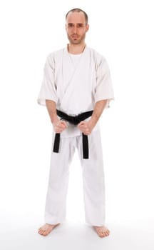 White man doing martial arts on isolated background