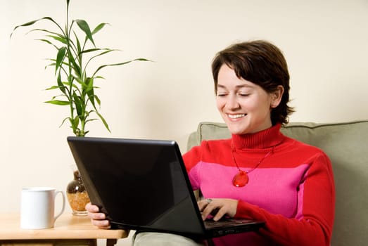 woman on the internet at home on couch