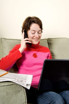 woman surfking the internet while on the phone
