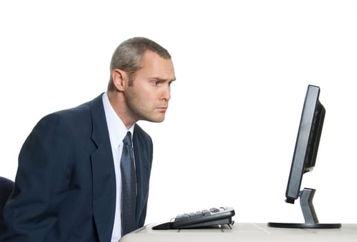 man in blue suit looking at lcd monitor