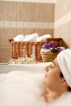 bath in a spa with a woman in it to relax