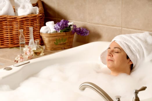 woman taking a aroma bath at a day spa