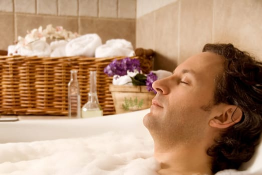man client in a spa taking an aroma bath