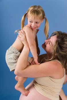 mother and her kid playing in the air