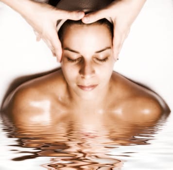 woman relaxing with a nice facial massage