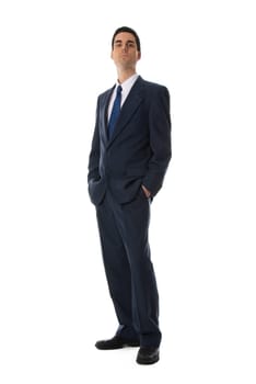 businessman with his hands in his pockets on white