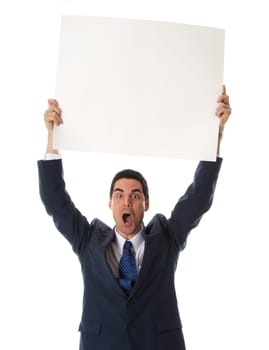 man in blue suit holing a card above his head