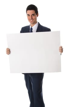 businessman in blue suit holding a white card