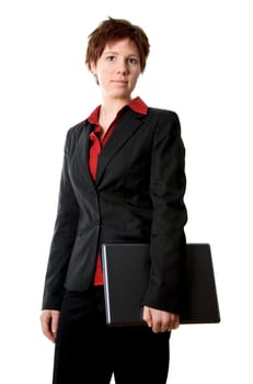 cute girl in jacket holding a laptop