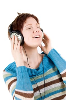 cute girl in casual clothes listening to music