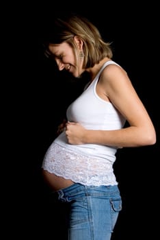 pregnant woman wearing a white lace top
