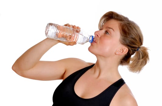 cute blond woman drinking from a bottle