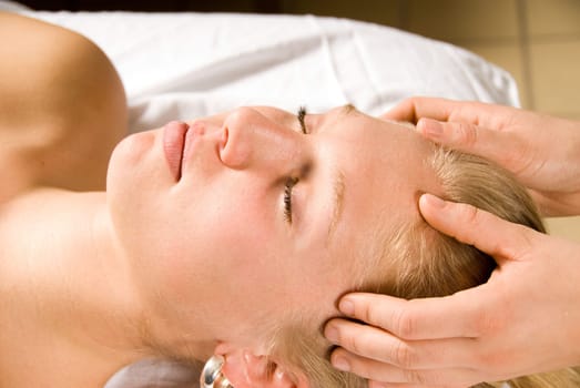 woman on a massage table at a spa