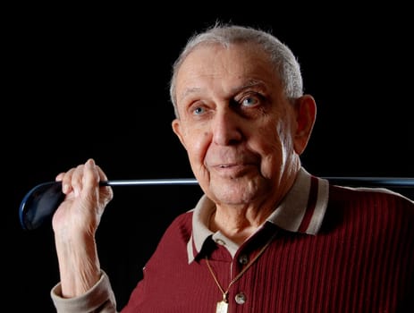 happy grandfather with his gold club smiling