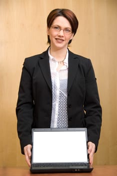 happy business woman showing off her nice laptop