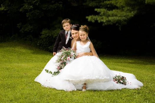 White Bride at her wedding posing with veil