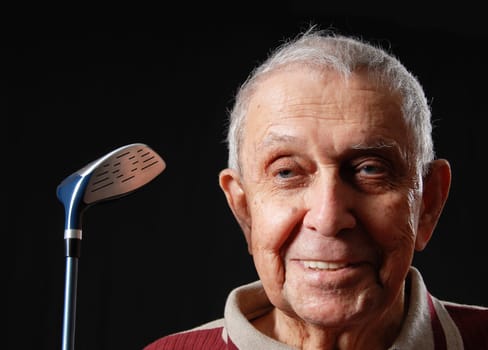 happy grandfather with his gold club smiling