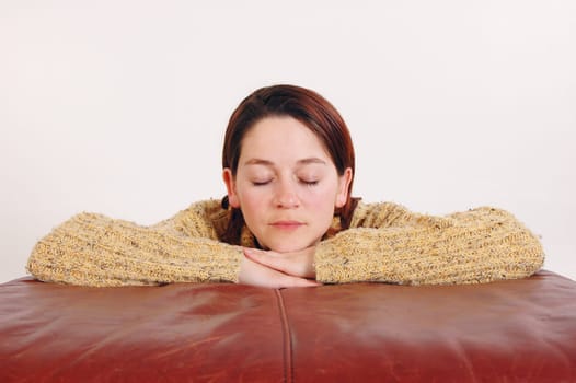 young woman relaxing with her eyes closed
