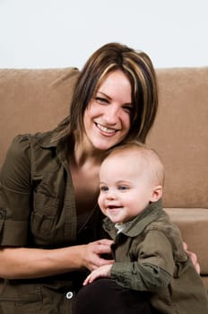 mom happy with their baby boy blue eyes