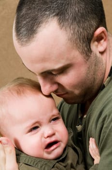 father with his young baby boy son
