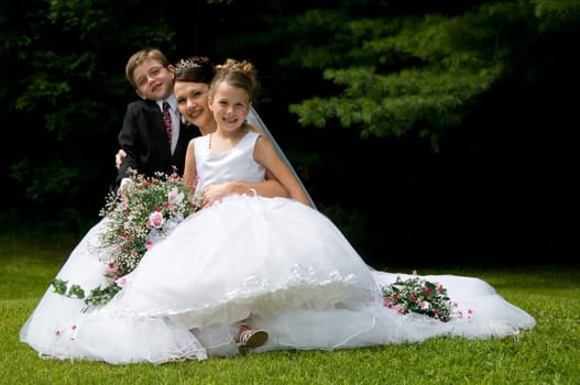 White Bride at her wedding posing with veil