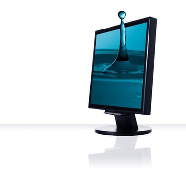 a computer flat screen monitor with water drop