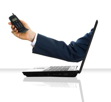 a hand giving his cell phone from a laptop