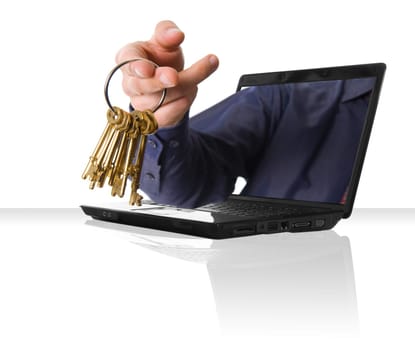 a black laptop computer with a hand and some gold keys