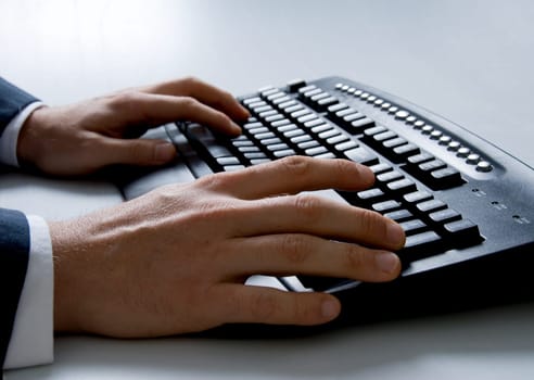 hans on a computer keyboard