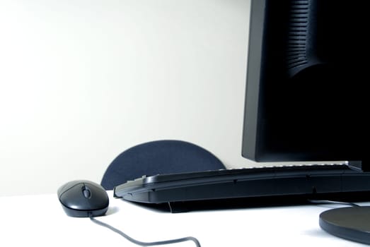 business setup with computer and keyboard