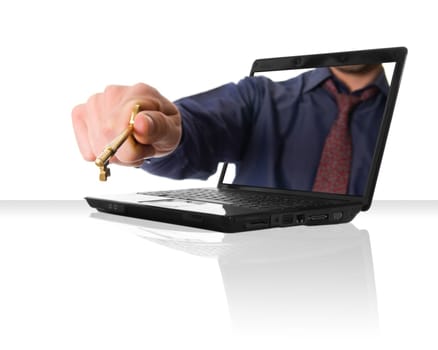 a black laptop computer with a hand and a golden key