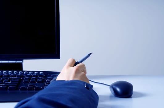 businessman in front of a computer