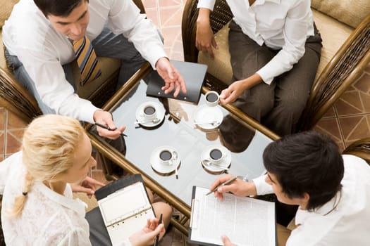 Close up of conversation of confident businesspeople in the room