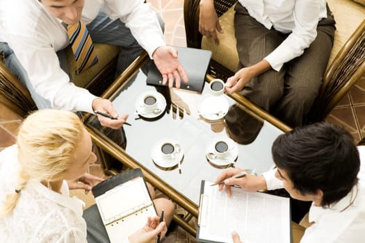 Close up of conversation of confident businesspeople in the room