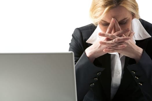 Photo of depressed female being worried by problems in business