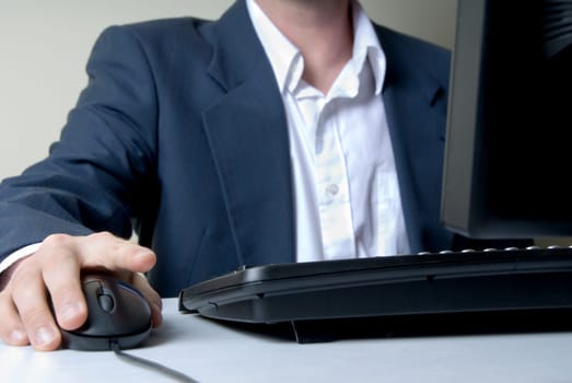 businessman on the computer with mouse