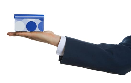 hand in blue suit holding a gift box